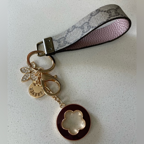 Authentic designer Keychain with Perfume Bottle Charm - Picture 3 of 6